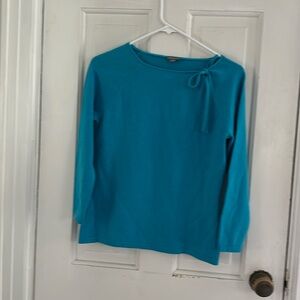 Turquoise cashmere sweater.